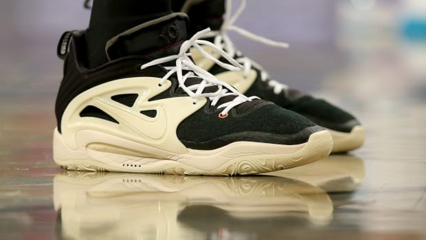 Black and sail Nike KD shoes.
